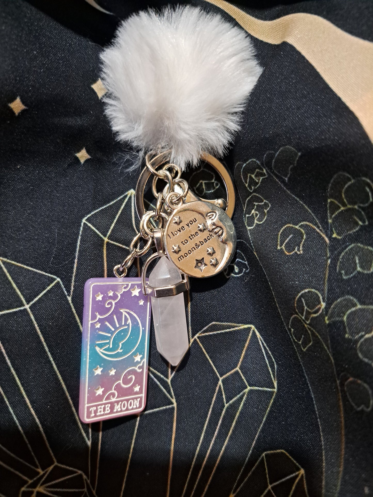 White pom keychain with real crystal amethyst and pink sign