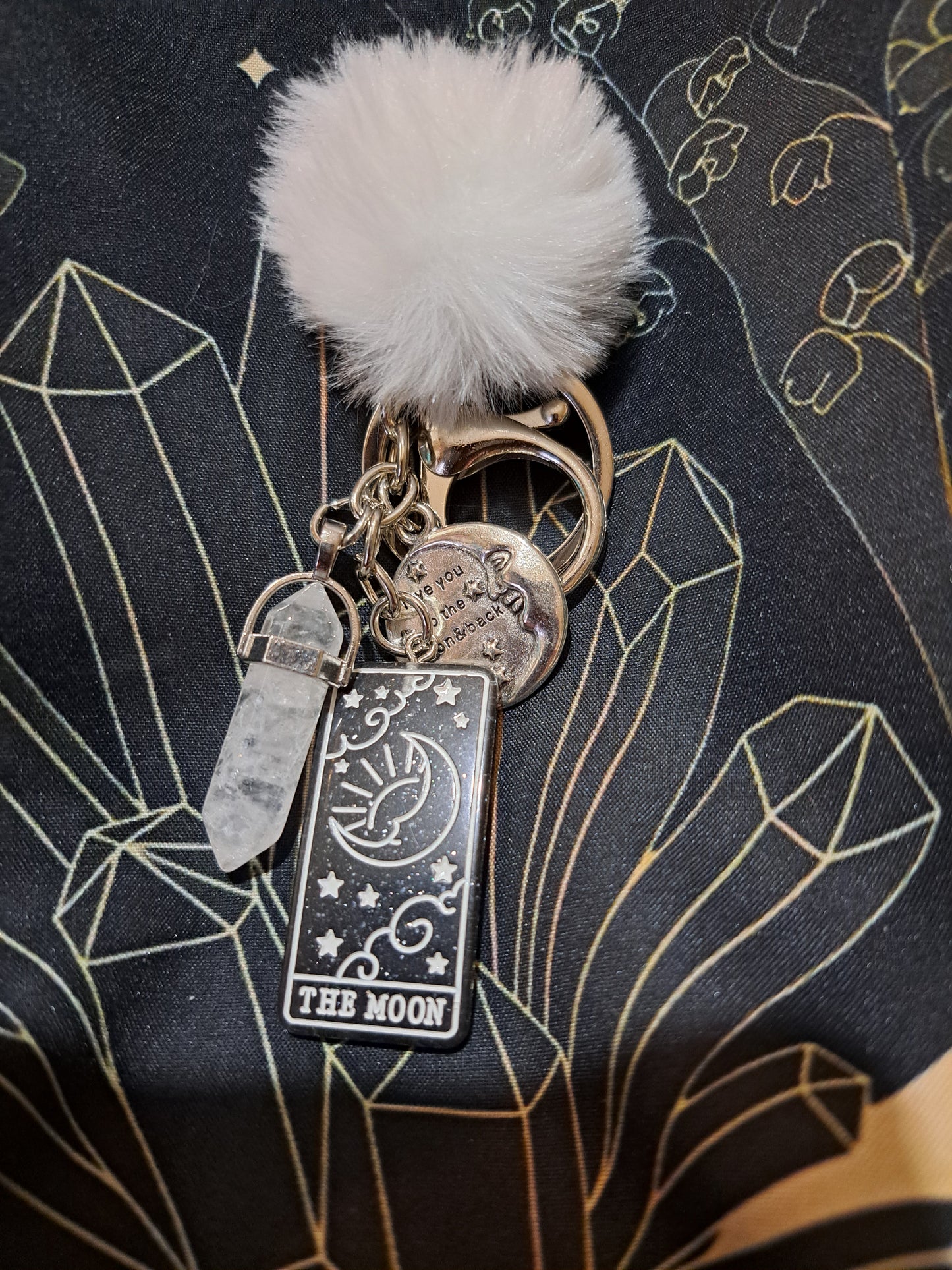 White Pom keychain with, a real Clear Quartz crystal, Love you to the moon and back charm with resin 'the moon' plaque