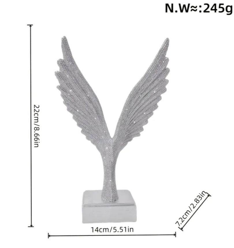 Silvery Winged Ornament, Resembling a Great Spreading Its Wings, Is Adorned with Sparkling 'Star Diamonds'