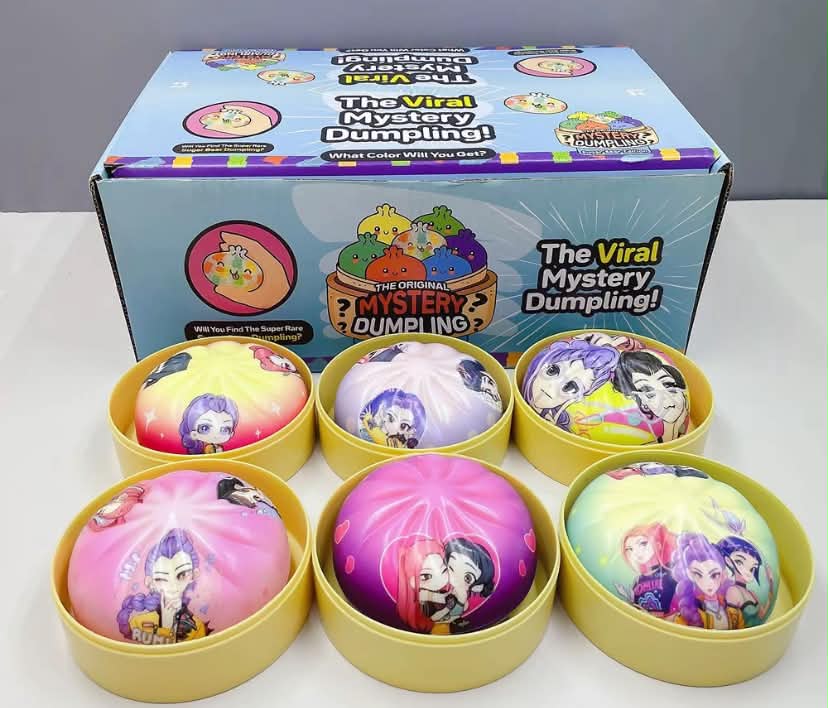 1 PC exorcism girl group cartoon character dumplings, squid sensory toys with cage Random