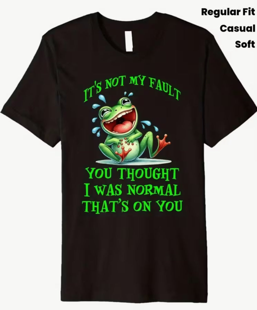 Funny Frog T-Shirt for Men & Women - "It'S Not My Fault You Thought I Was Normal" Slogan with Smiling Green Frog & Dart Design, 100% Soft Crewneck Retro Graphic Tee, Casual Regular Fit Black Shirt with Vibrant Green Print