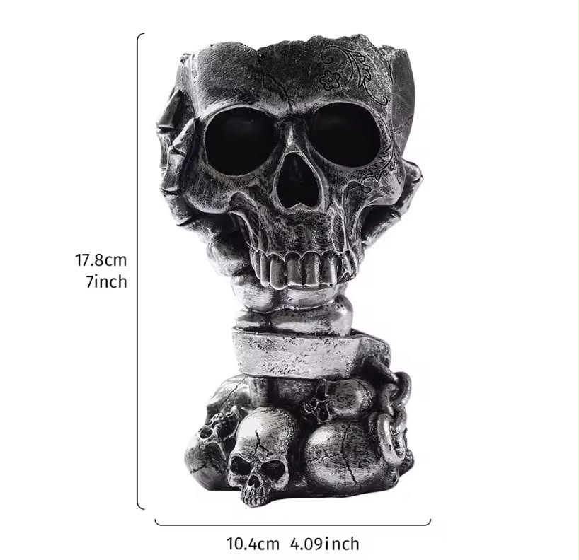 silver-black skull-shaped vases