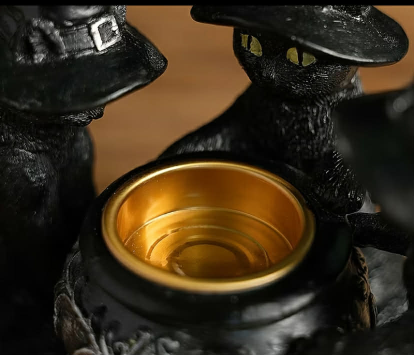 A Halloween Decoration Featuring a Wizard Cat Sculpture Made of Resin, Perfect for Festive Home Decor