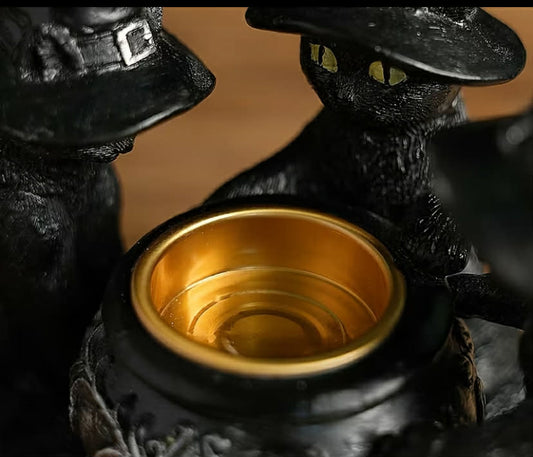 A Halloween Decoration Featuring a Wizard Cat Sculpture Made of Resin, Perfect for Festive Home Decor