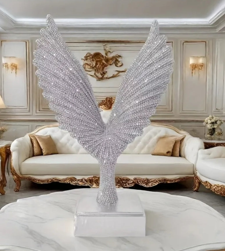 Silvery Winged Ornament, Resembling a Great Spreading Its Wings, Is Adorned with Sparkling 'Star Diamonds'
