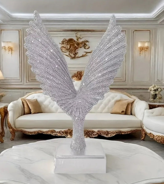 Silvery Winged Ornament, Resembling a Great Spreading Its Wings, Is Adorned with Sparkling 'Star Diamonds'